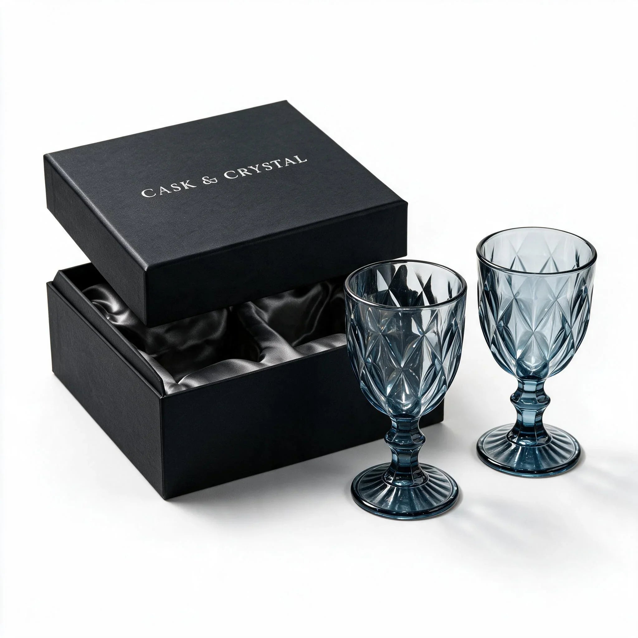 Marina blue cocktail glass with diamond cut facets and a short stem