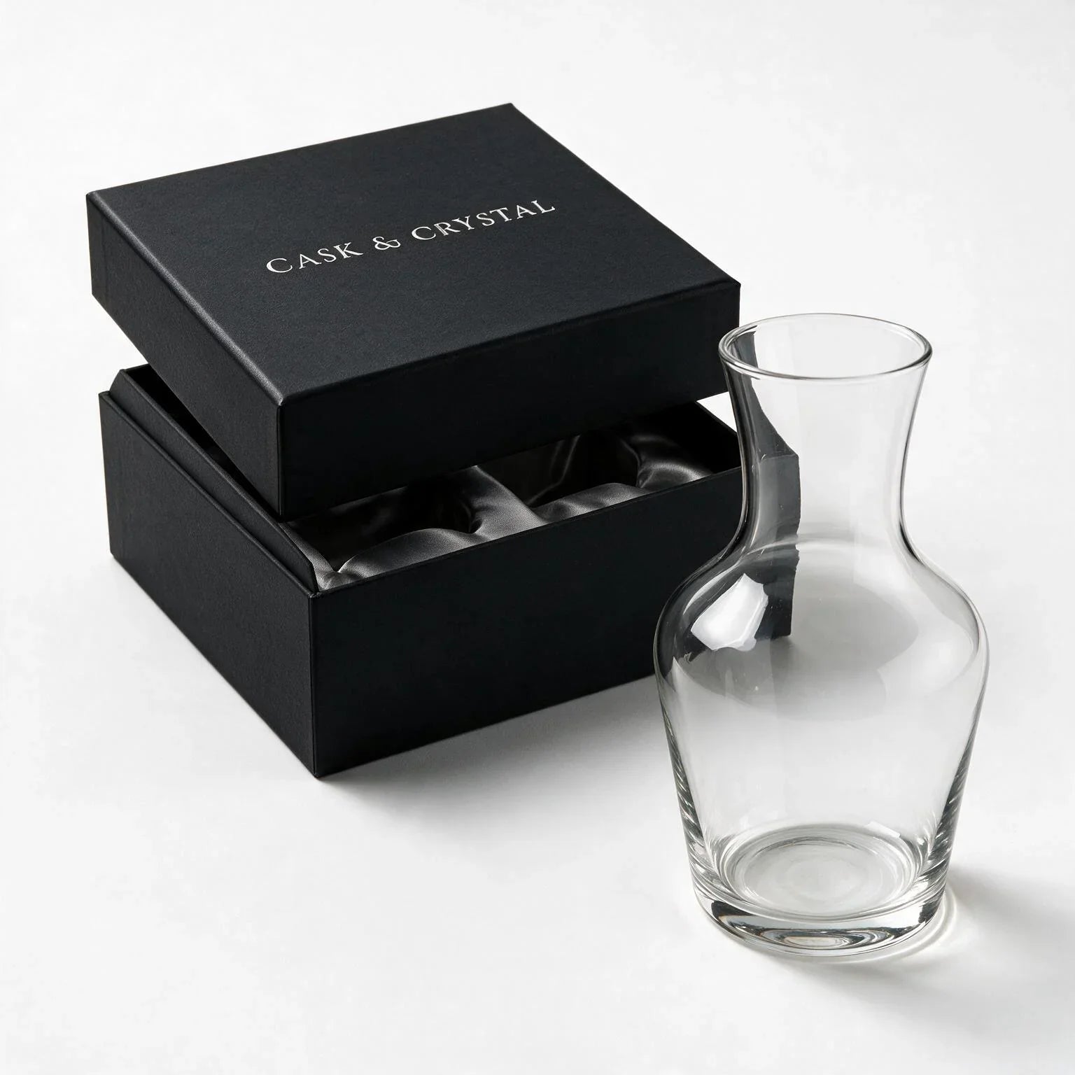 Luna clear glass carafe with a clean silhouette and flared neck