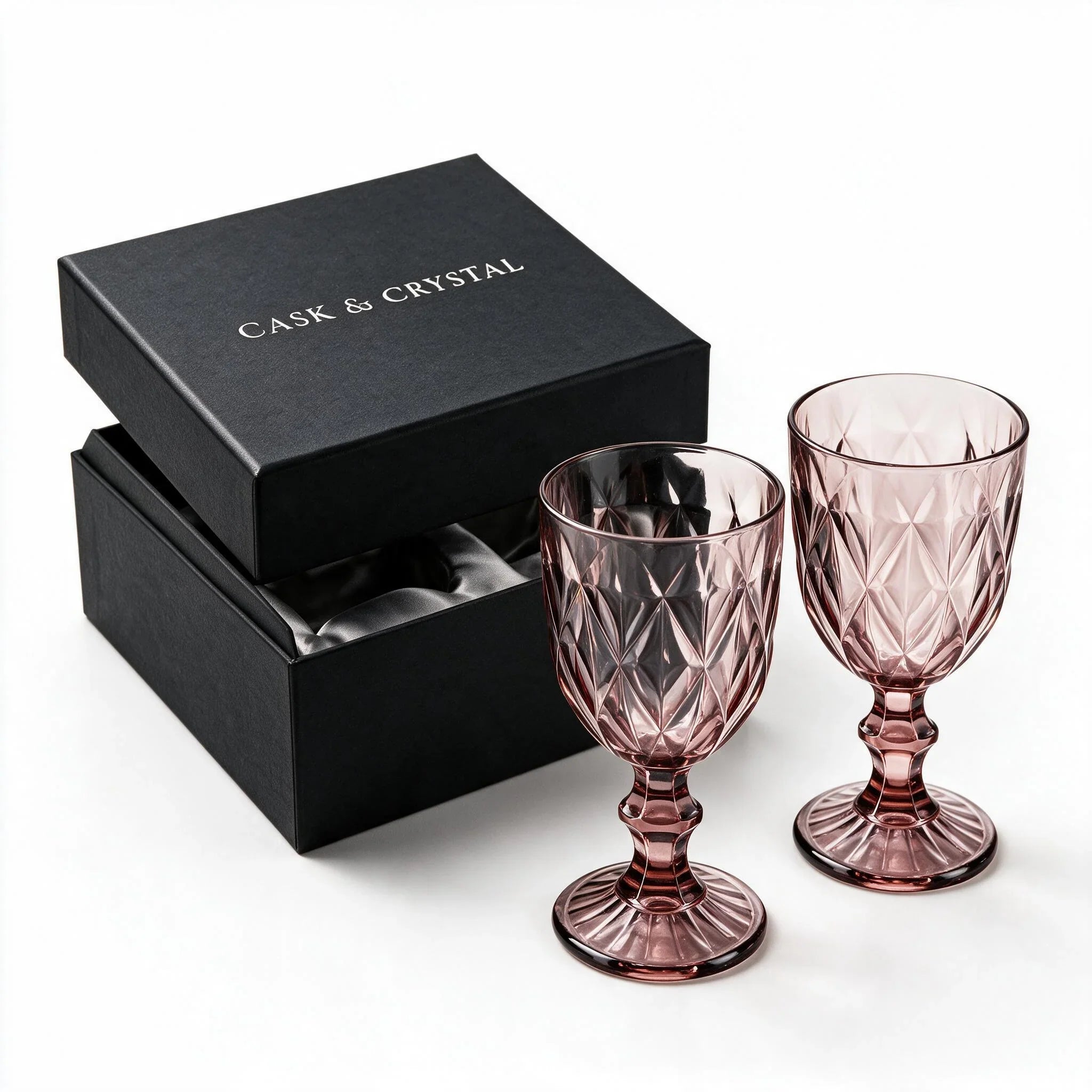 Amara dusky rose cocktail glass with diamond cut facets and a short stem