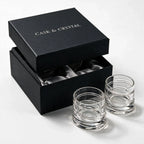 Helix clear whisky glass with a slanted rim and sweeping textured design