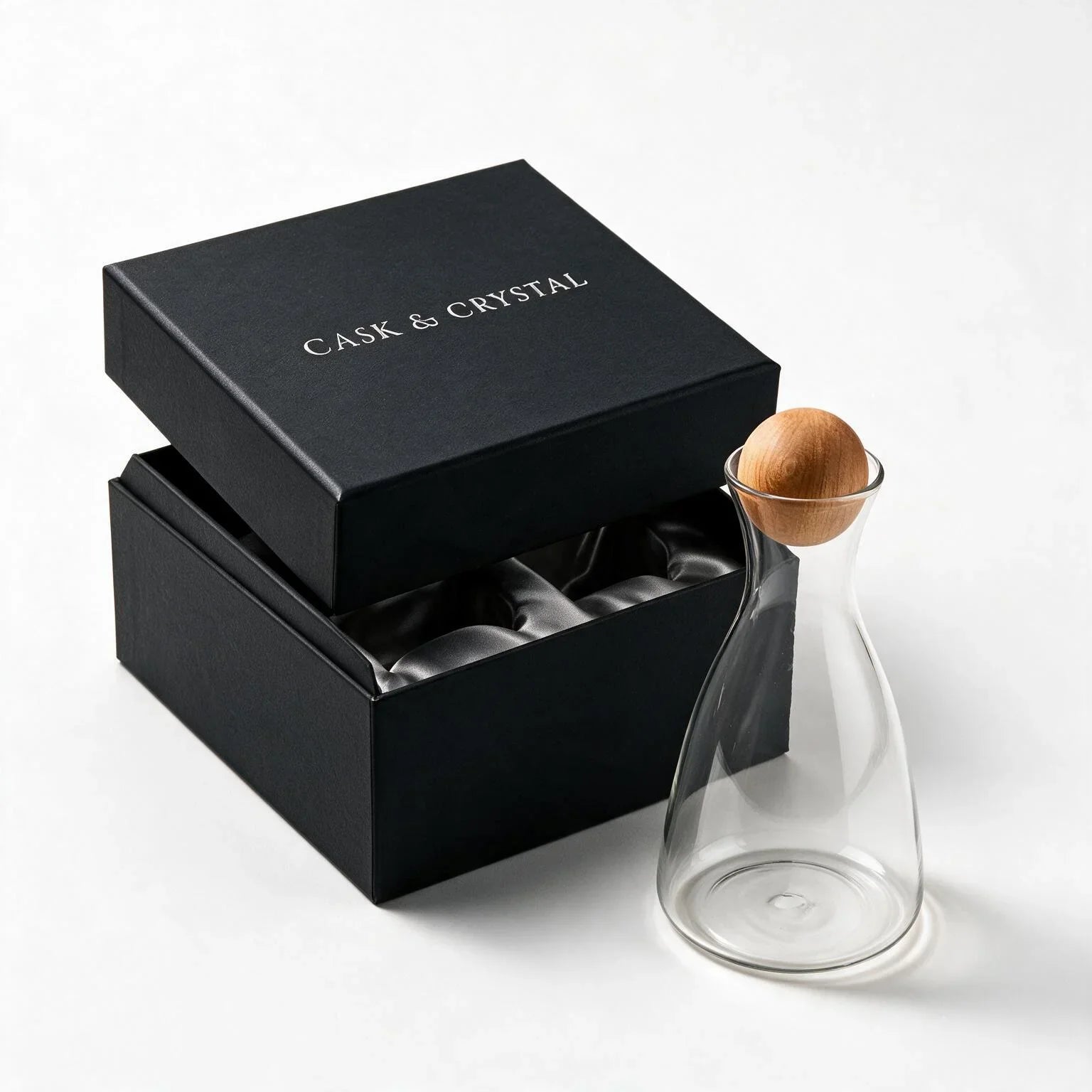 Orla clear glass decanter with a spherical wooden stopper