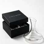 Marcel clear glass wine decanter with a wide base and slanted rim