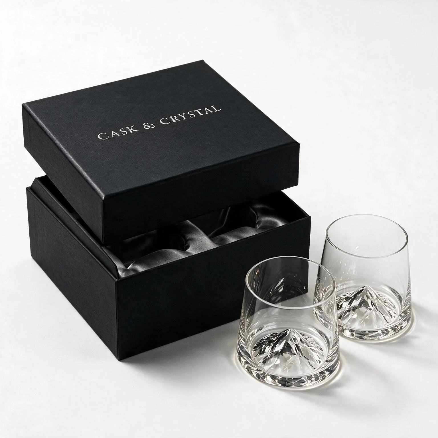 Vale modern whiskey glass with a sculpted mountain base and subtly tapered sides 2