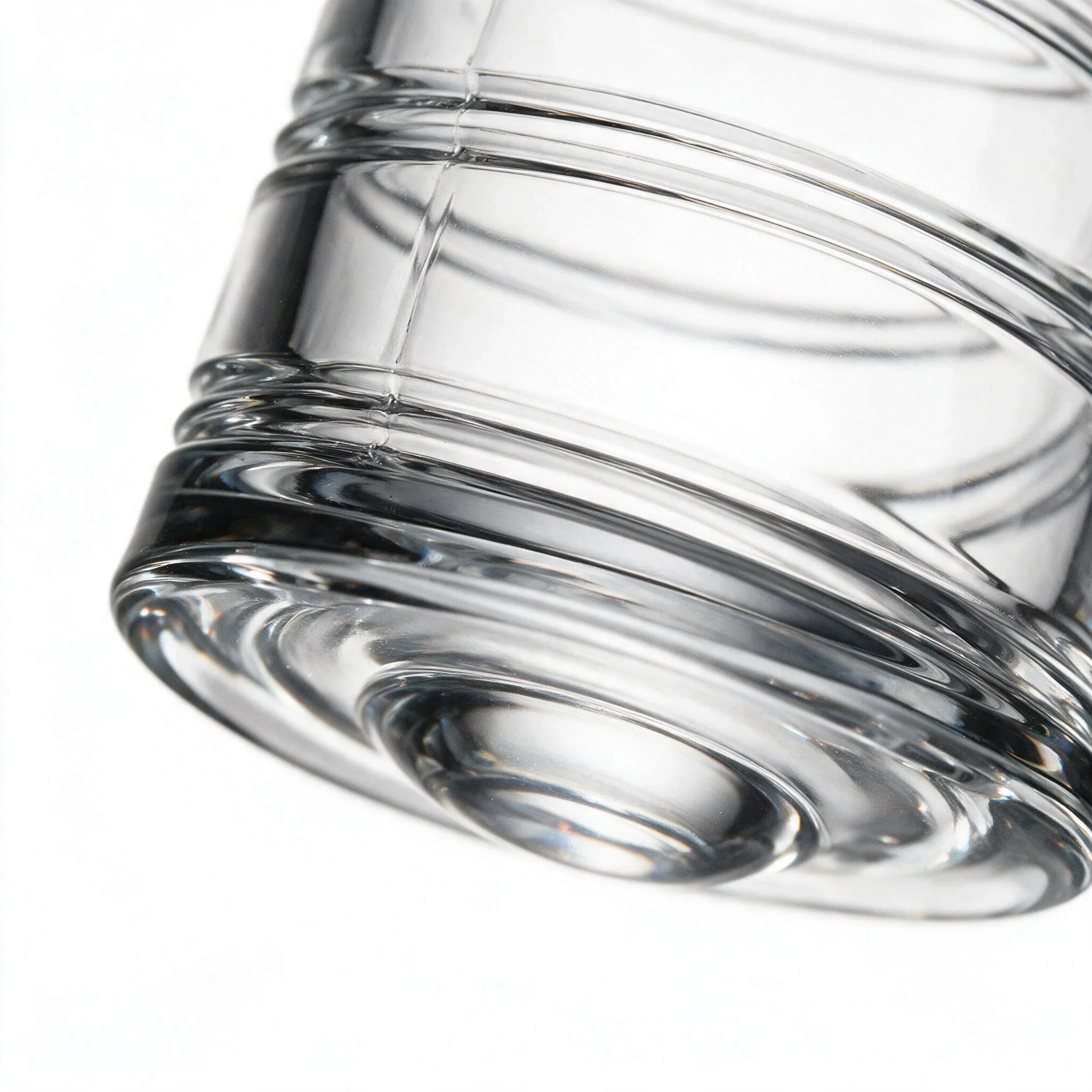 Helix clear whisky glass with a slanted rim and sweeping textured design