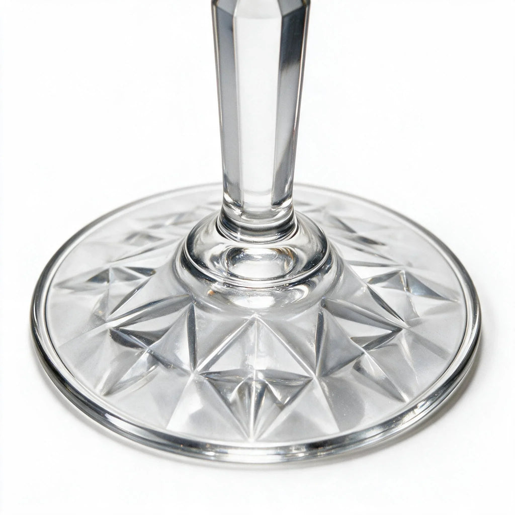 Lumina clear cocktail glass with a tall stem and geometric diamond cut bowl