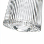 Coda clear whisky glass with a rotating base and ribbed texture