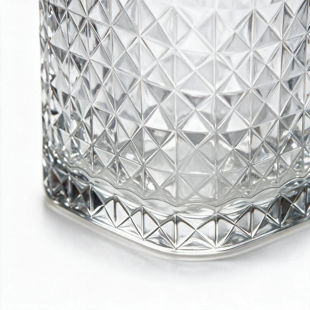 Astor clear whisky glass with diamond cut facets and a square base