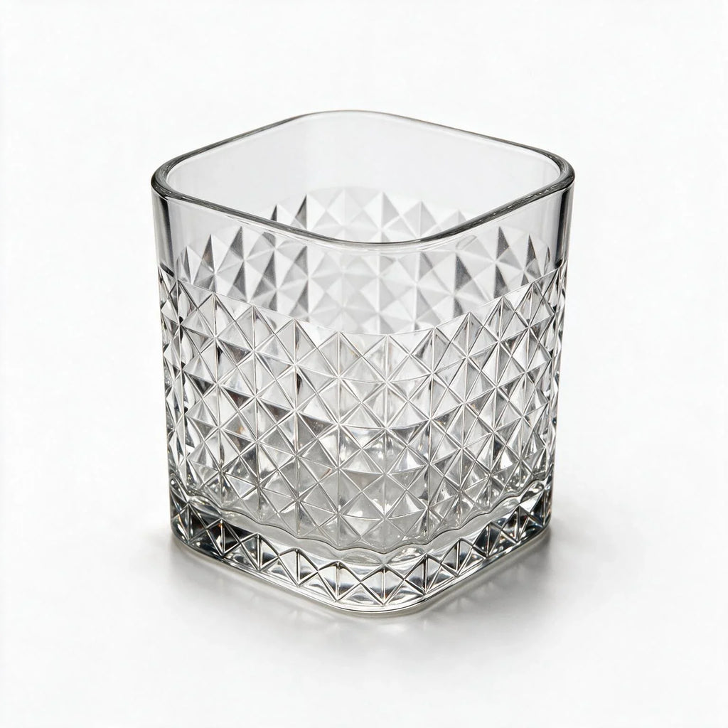 Astor clear whisky glass with diamond cut facets and a square base