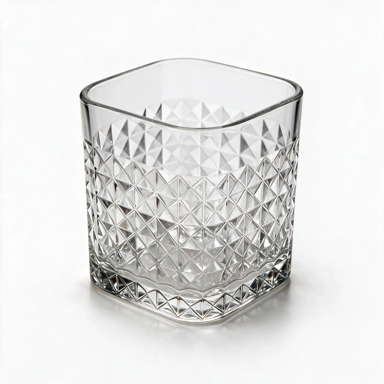 Astor clear whisky glass with diamond cut facets and a square base