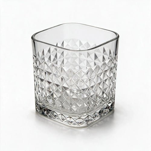 Astor clear whisky glass with diamond cut facets and a square base