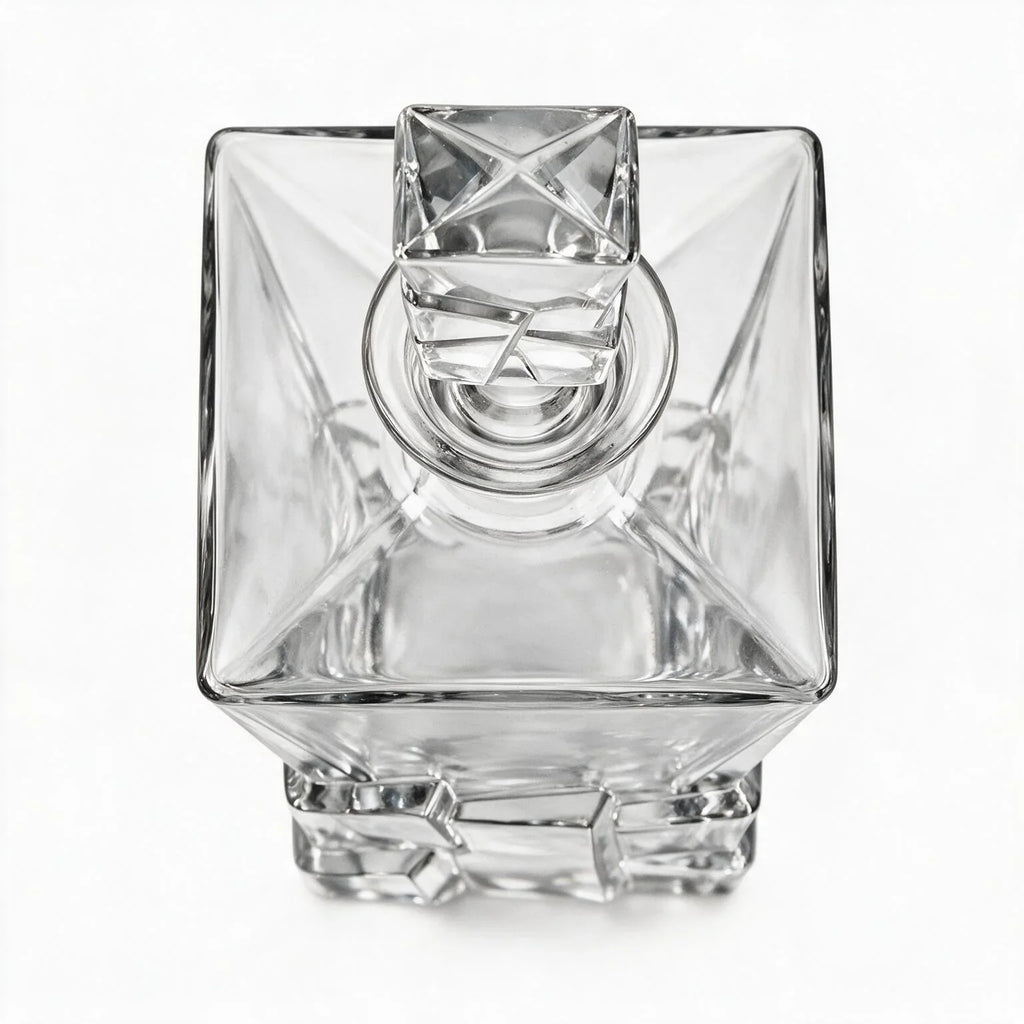 Vanguard clear glass whisky decanter with a bold geometric base and matching stopper