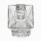 Vanguard clear glass whisky decanter with a bold geometric base and matching stopper