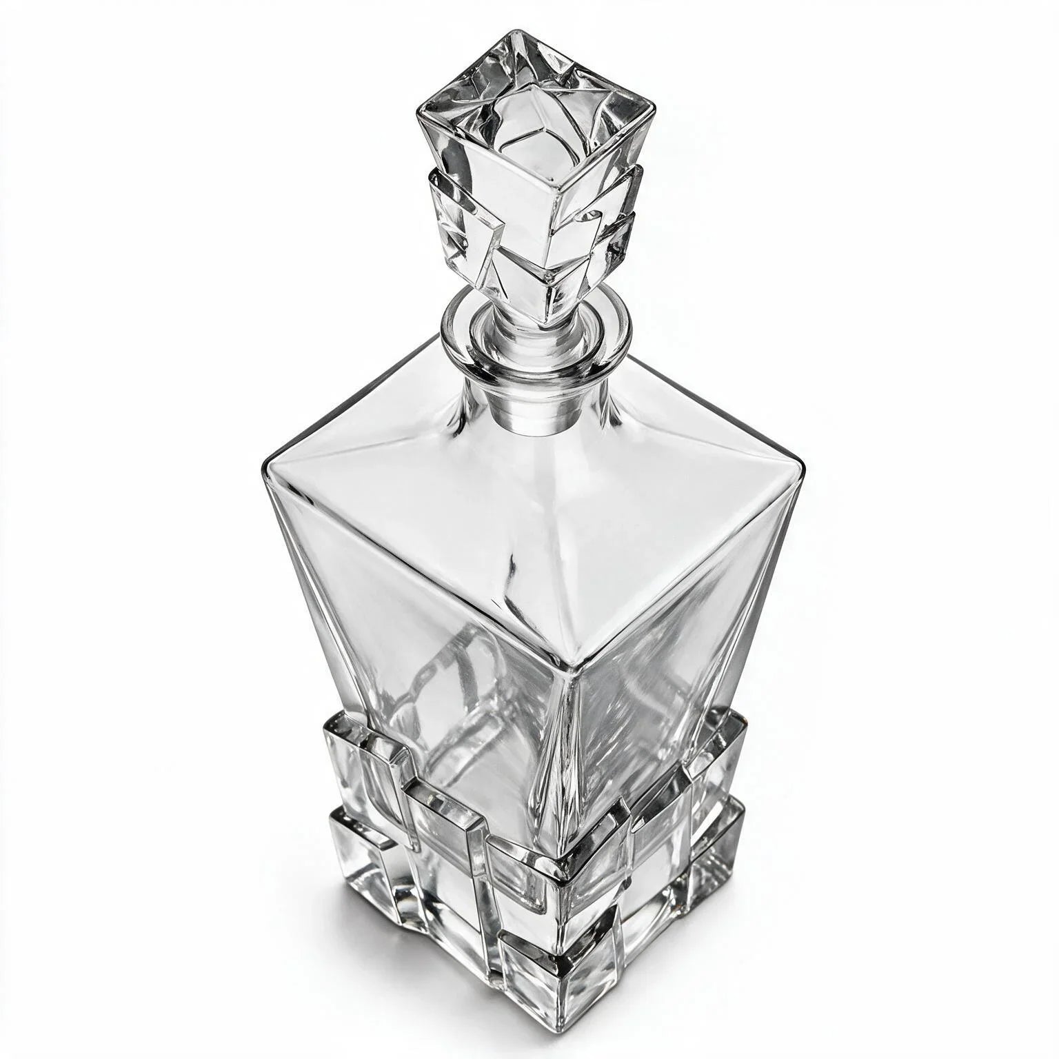 Vanguard clear glass whisky decanter with a bold geometric base and matching stopper