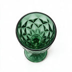 Sylvan green cocktail glass with diamond cut facets and a short stem