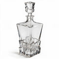 Vanguard clear glass whisky decanter with a bold geometric base and matching stopper