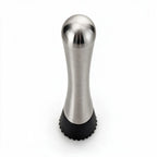 Remi stainless steel cocktail muddler with a black textured head