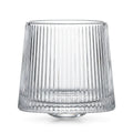 Coda clear whisky glass with a rotating base and ribbed texture