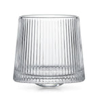 Coda clear whisky glass with a rotating base and ribbed texture