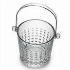 Valen clear glass ice bucket with diamond cut facets and a metal handle