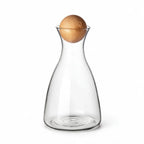 Orla clear glass decanter with a spherical wooden stopper