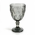 Nocturne black cocktail glass with diamond cut facets and a short stem