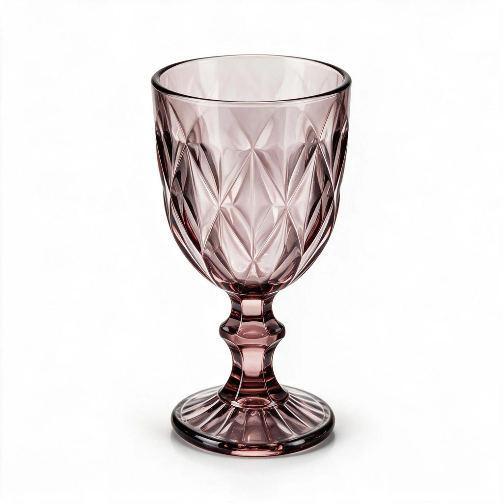 Amara dusky rose cocktail glass with diamond cut facets and a short stem