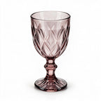 Amara dusky rose cocktail glass with diamond cut facets and a short stem