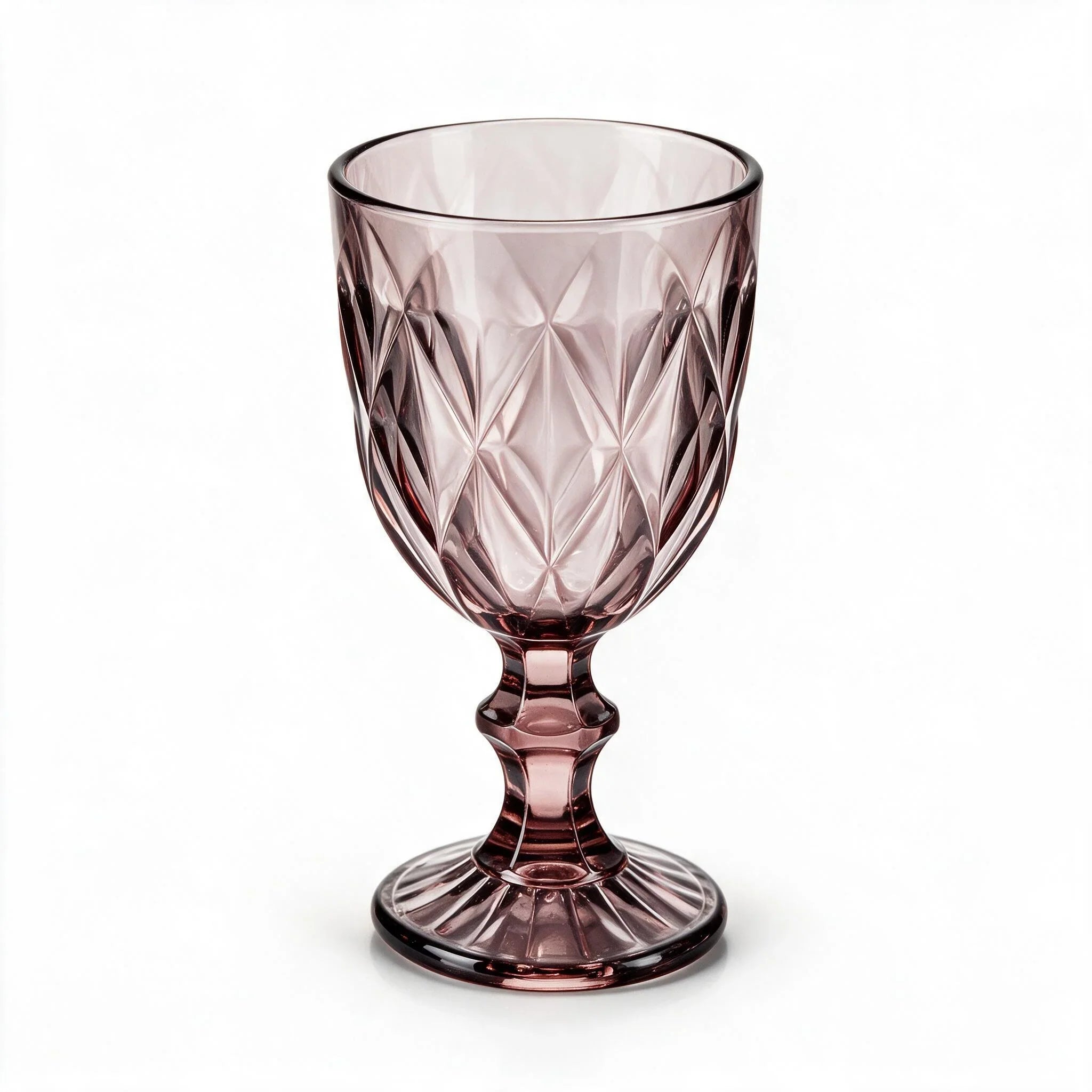 Amara dusky rose cocktail glass with diamond cut facets and a short stem
