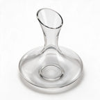 Marcel clear glass wine decanter with a wide base and slanted rim