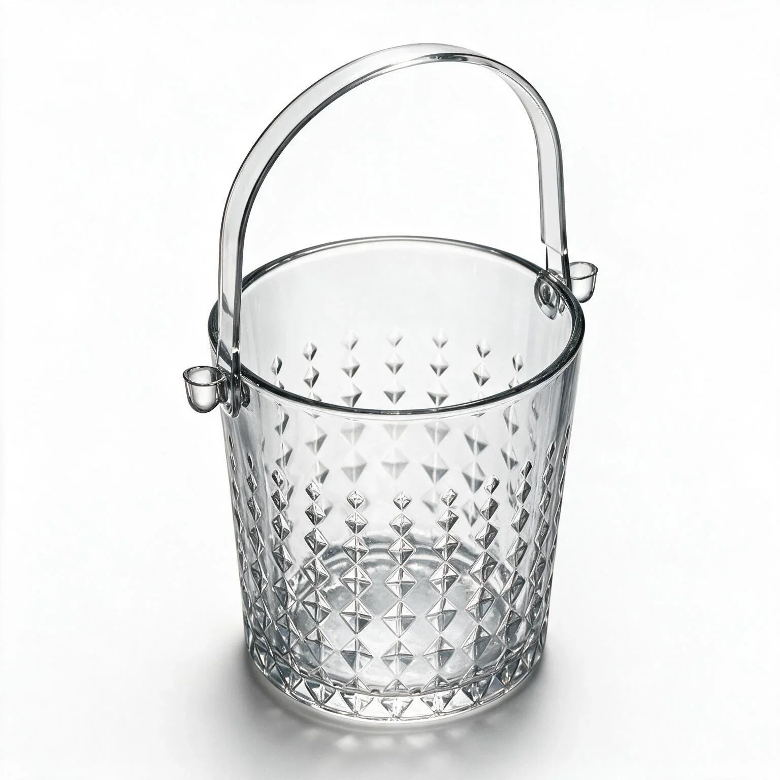 Valen clear glass ice bucket with diamond cut facets and a metal handle