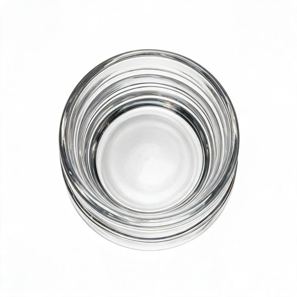Helix clear whisky glass with a slanted rim and sweeping textured design