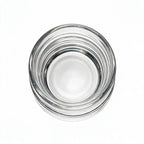Helix clear whisky glass with a slanted rim and sweeping textured design