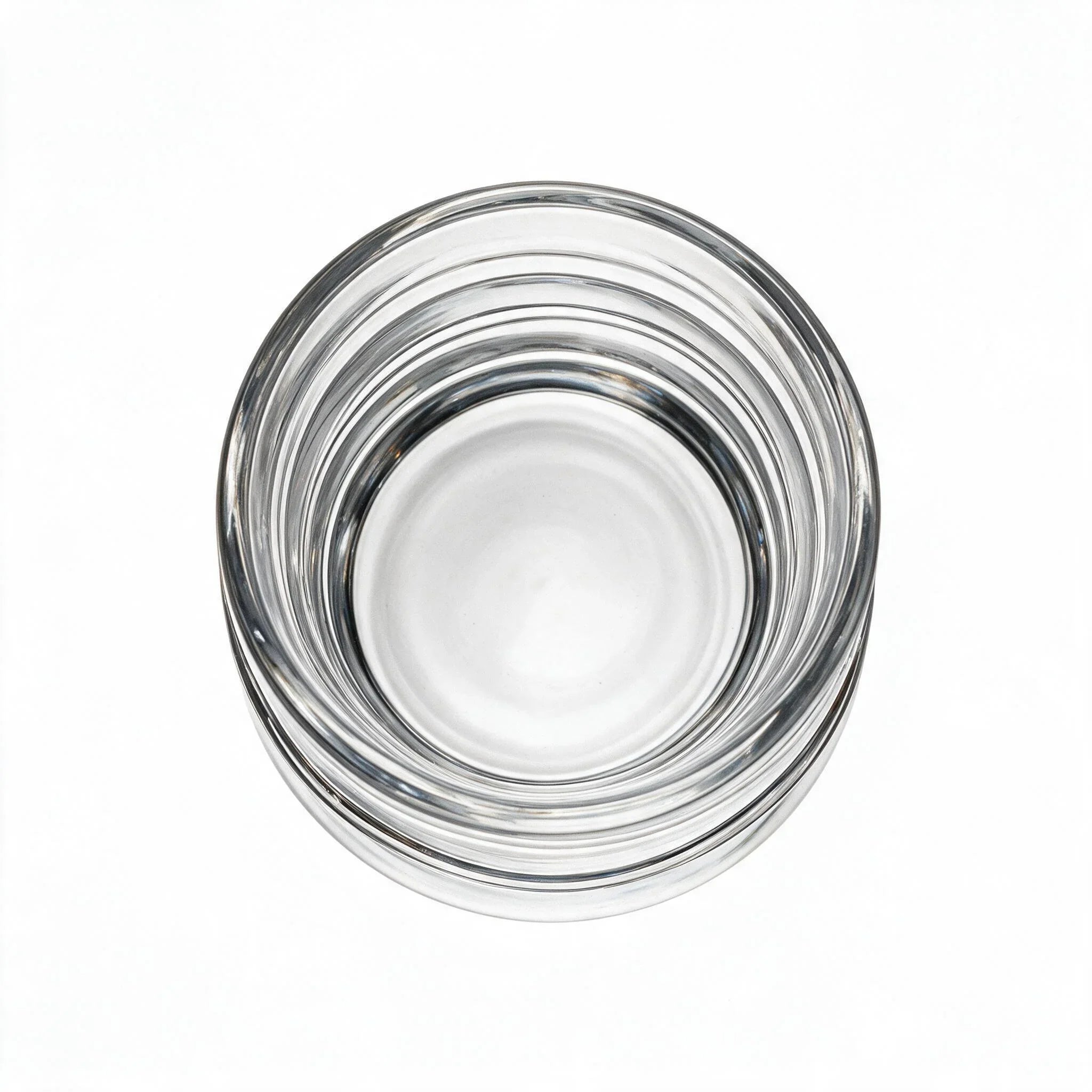 Helix clear whisky glass with a slanted rim and sweeping textured design