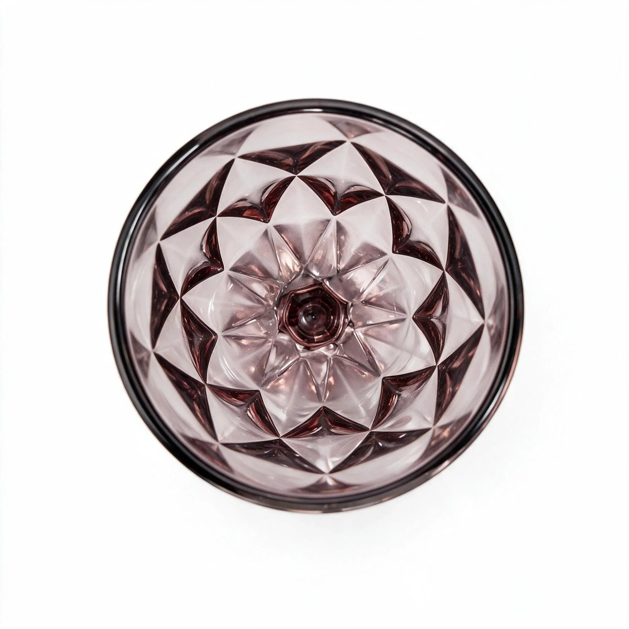 Amara dusky rose cocktail glass with diamond cut facets and a short stem