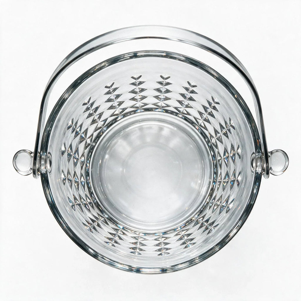 Valen clear glass ice bucket with diamond cut facets and a metal handle