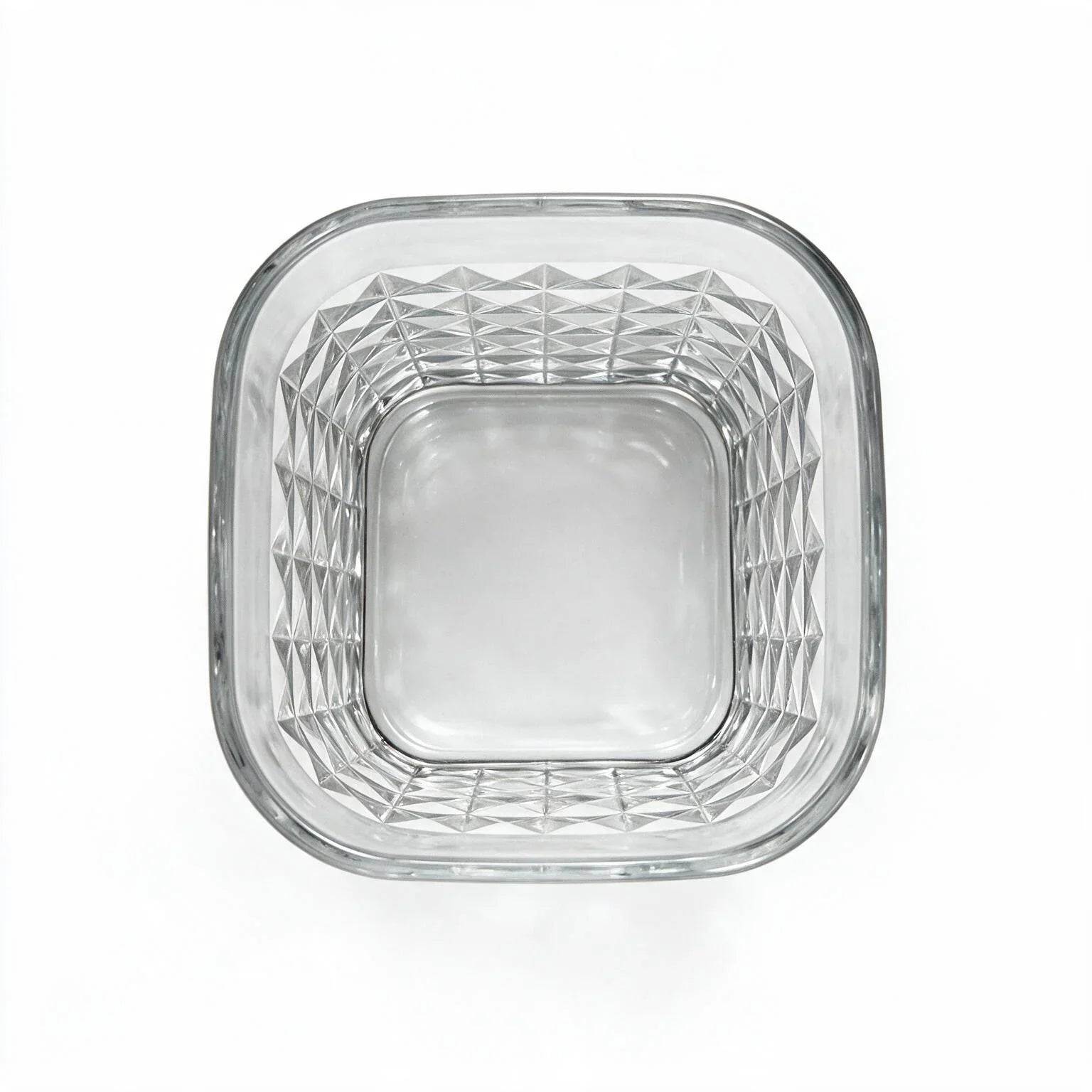 Astor clear whisky glass with diamond cut facets and a square base