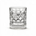 Cadence classic whisky glass featuring a heavily textured geometric pattern and flat base