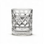 Cadence classic whisky glass featuring a heavily textured geometric pattern and flat base