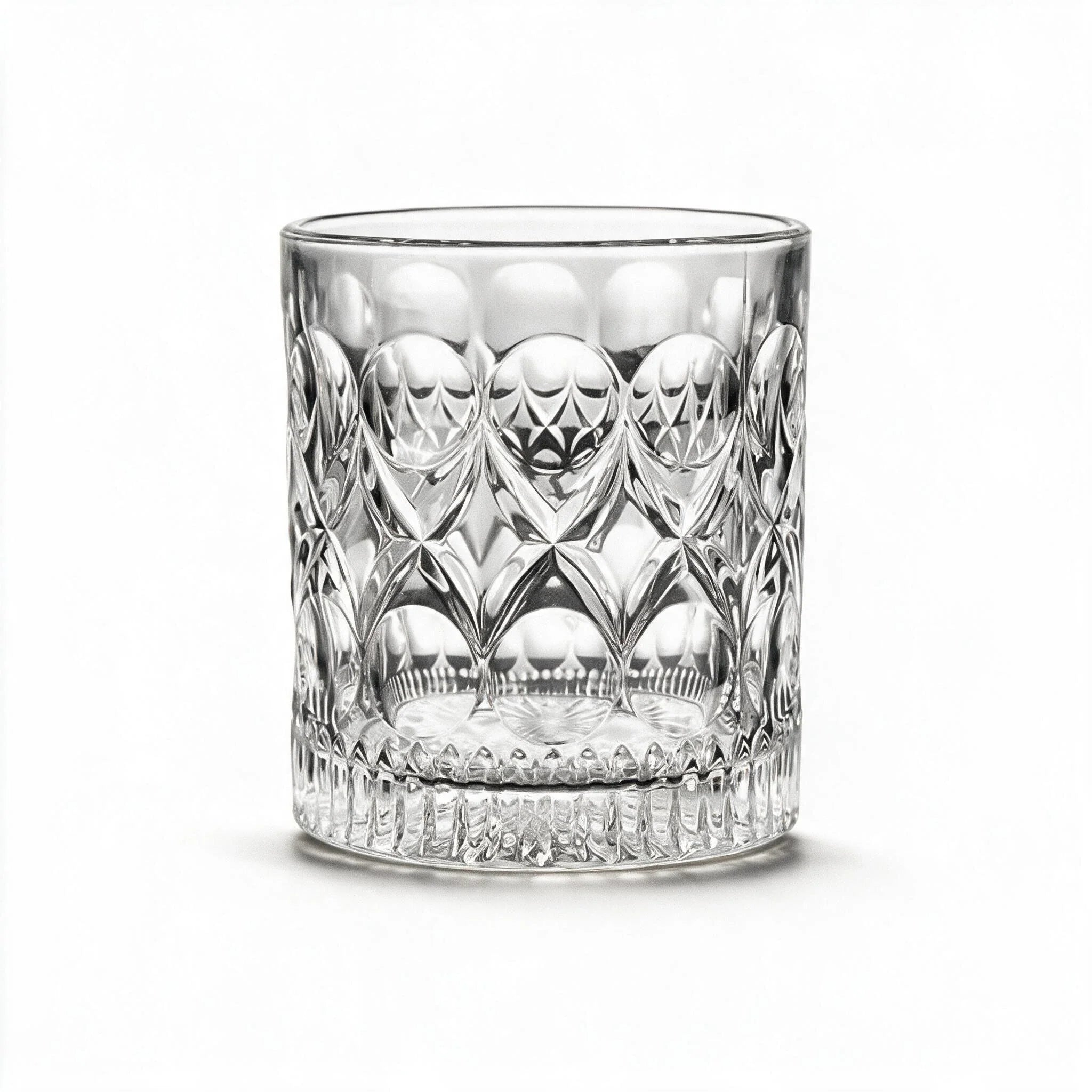 Cadence classic whisky glass featuring a heavily textured geometric pattern and flat base