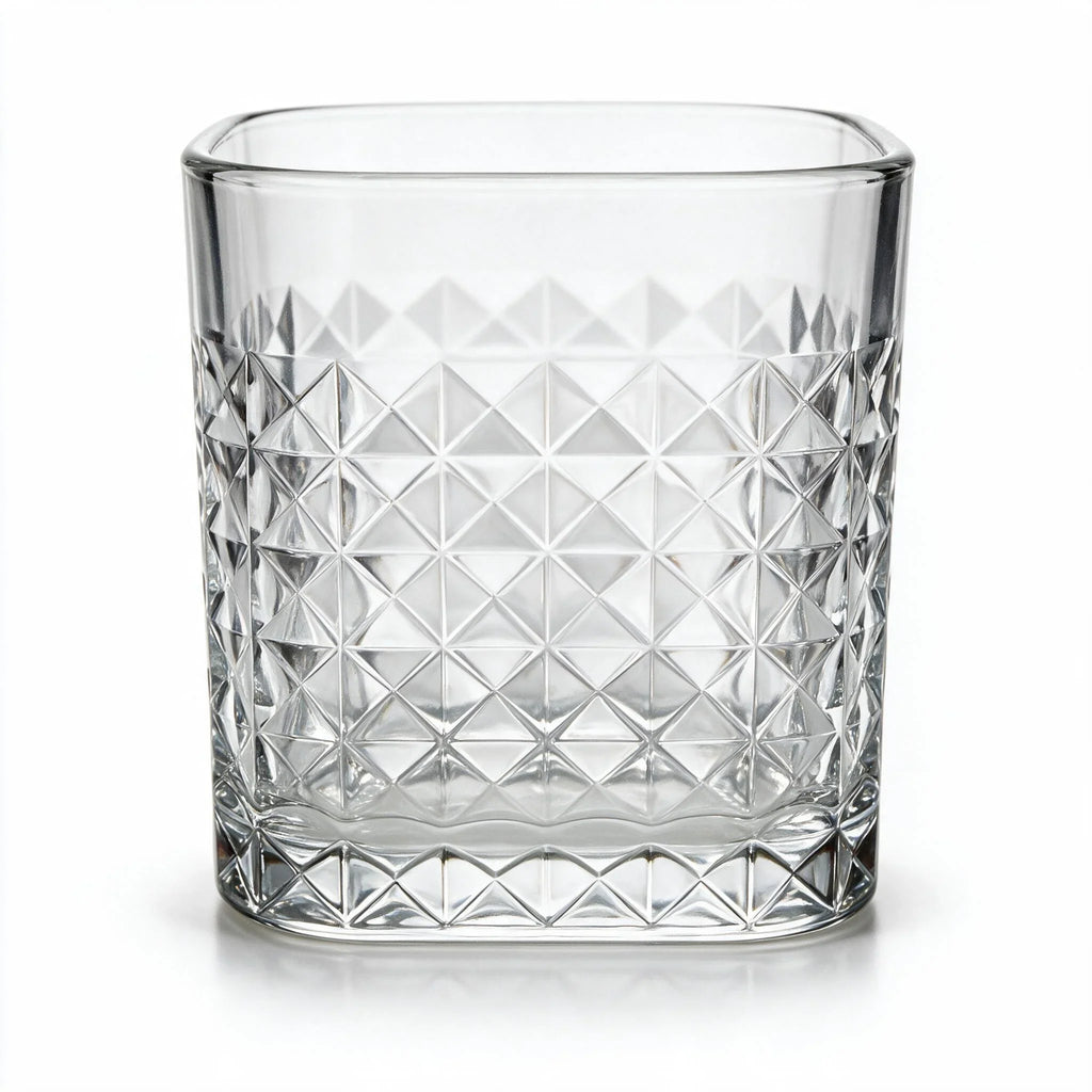 Astor clear whisky glass with diamond cut facets and a square base