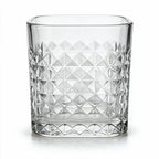 Astor clear whisky glass with diamond cut facets and a square base