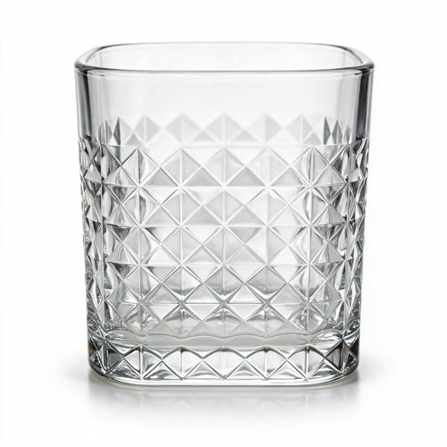 Astor clear whisky glass with diamond cut facets and a square base