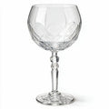 Lumina clear cocktail glass with a tall stem and geometric diamond cut bowl