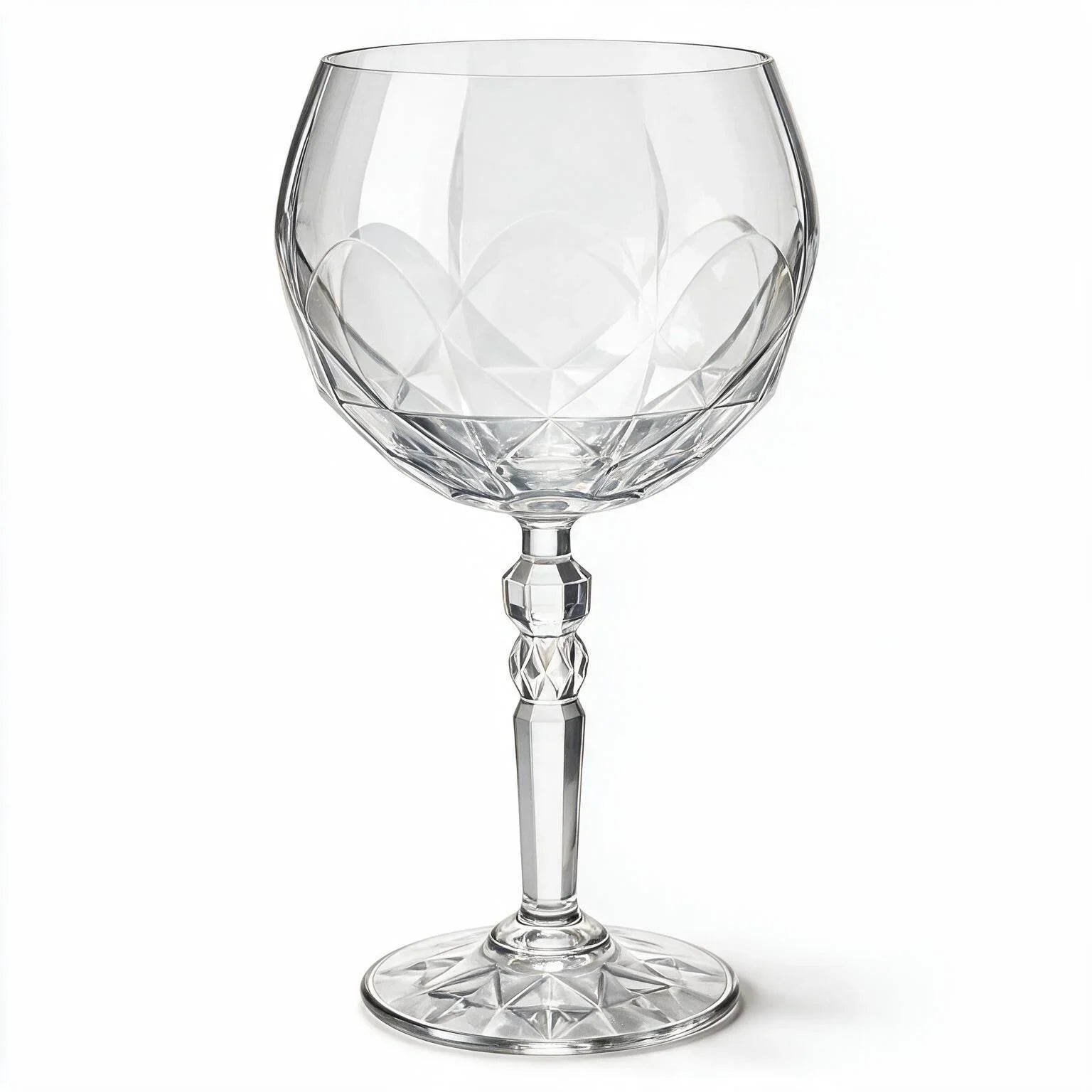 Lumina clear cocktail glass with a tall stem and geometric diamond cut bowl
