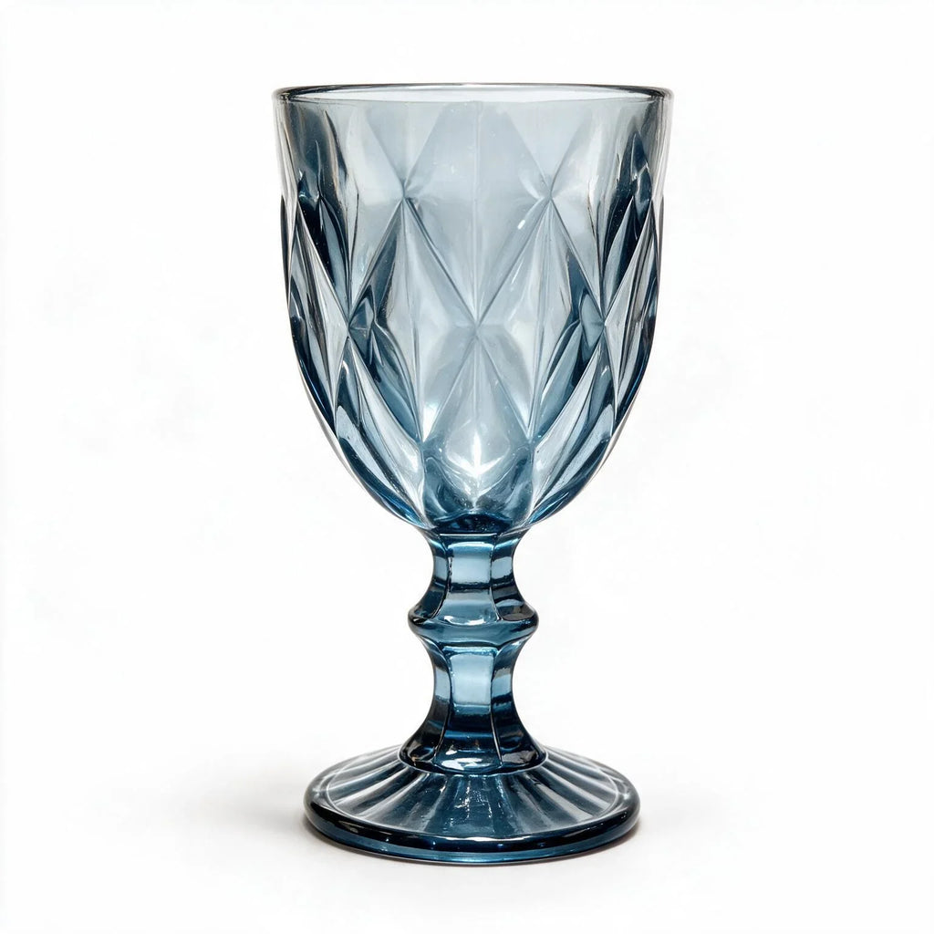 Marina blue cocktail glass with diamond cut facets and a short stem