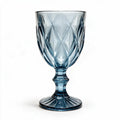 Marina blue cocktail glass with diamond cut facets and a short stem