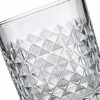 Astor clear whisky glass with diamond cut facets and a square base