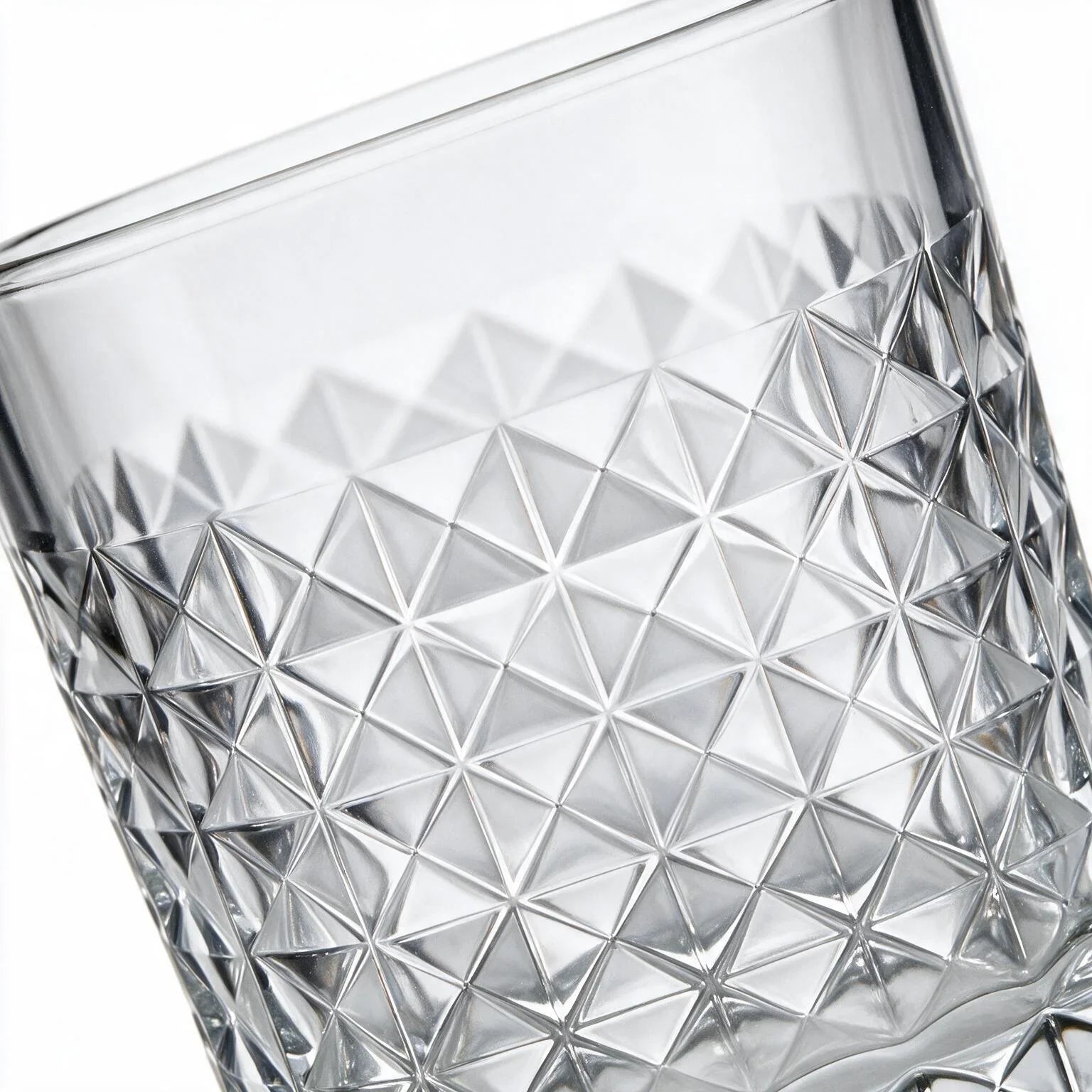 Astor clear whisky glass with diamond cut facets and a square base