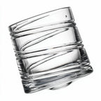 Helix clear whisky glass with a slanted rim and sweeping textured design