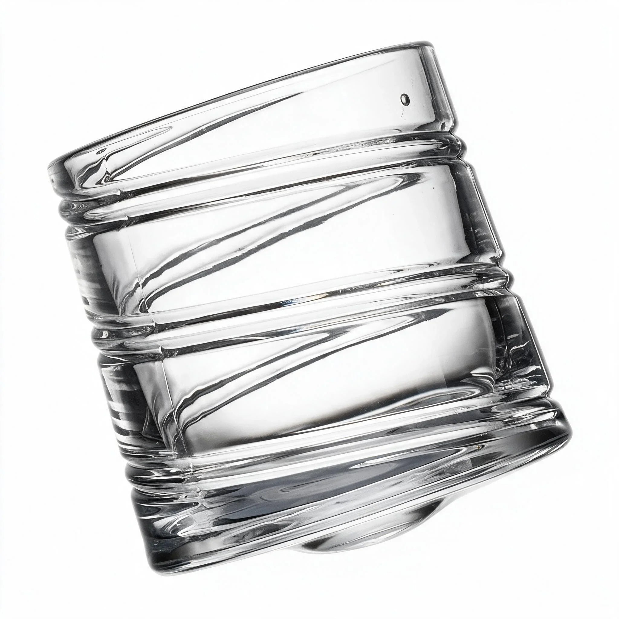 Helix clear whisky glass with a slanted rim and sweeping textured design